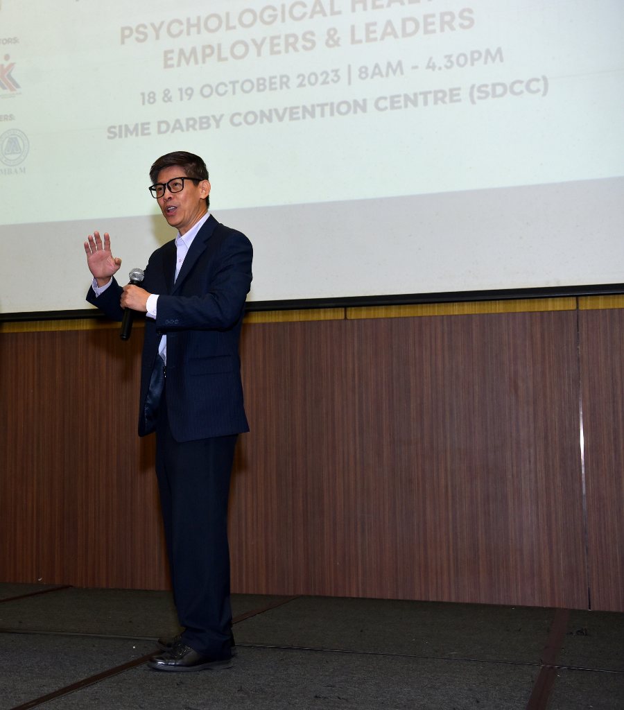 Winston Chew speaking on emotional intelligence and psychological health to employers and leaders